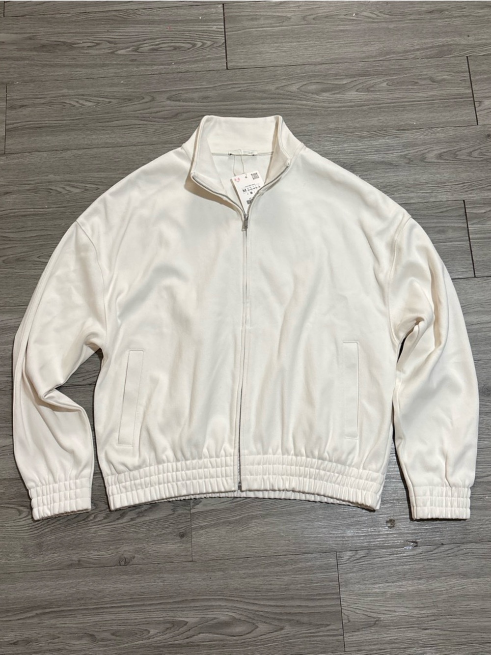 Zara cream and white zip up sweater.